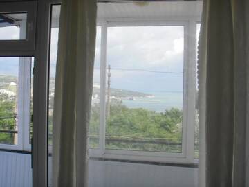 Фото номера Двухместный номер с 1 кроватью с видом на море Гостевой дом Guest house Horizont г. Балчик 15