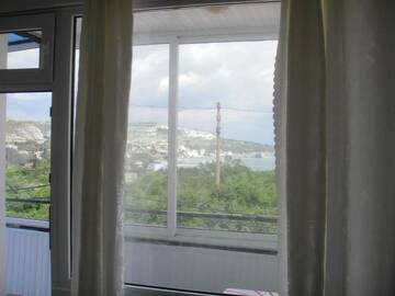 Фото номера Двухместный номер с 1 кроватью с видом на море Гостевой дом Guest house Horizont г. Балчик 14