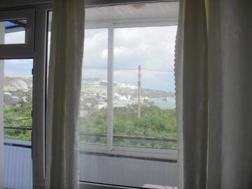 Фото номера Двухместный номер с 1 кроватью с видом на море Гостевой дом Guest house Horizont г. Балчик 5