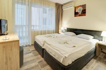 Фото номера Двухместный номер с 1 кроватью Отель Family Hotel Jupiter г. Балчик 5