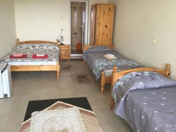 Фото номера Четырехместный номер с видом на море Гостевой дом Guest House Paskal г. Балчик 4